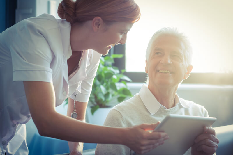 Nurse and patient talking